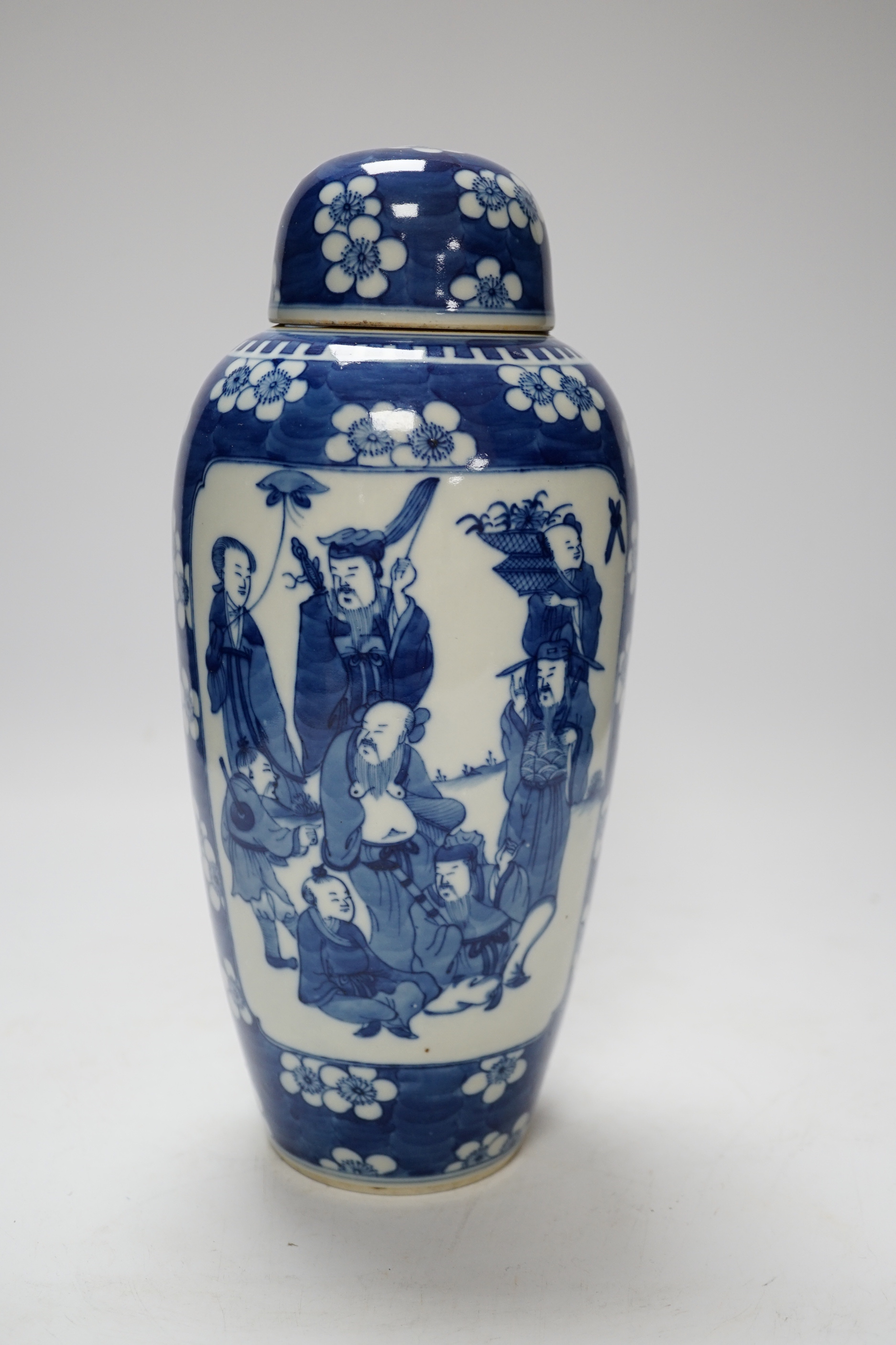 A Chinese blue and white ‘eight immortals’ jar and cover, circa 1900, 28cm